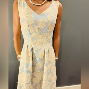 light blue dress with gold flowers design
